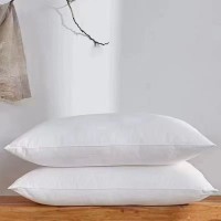 100% cotton with 90%white duck/goose down pillow